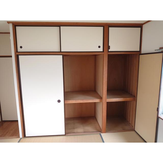 押入